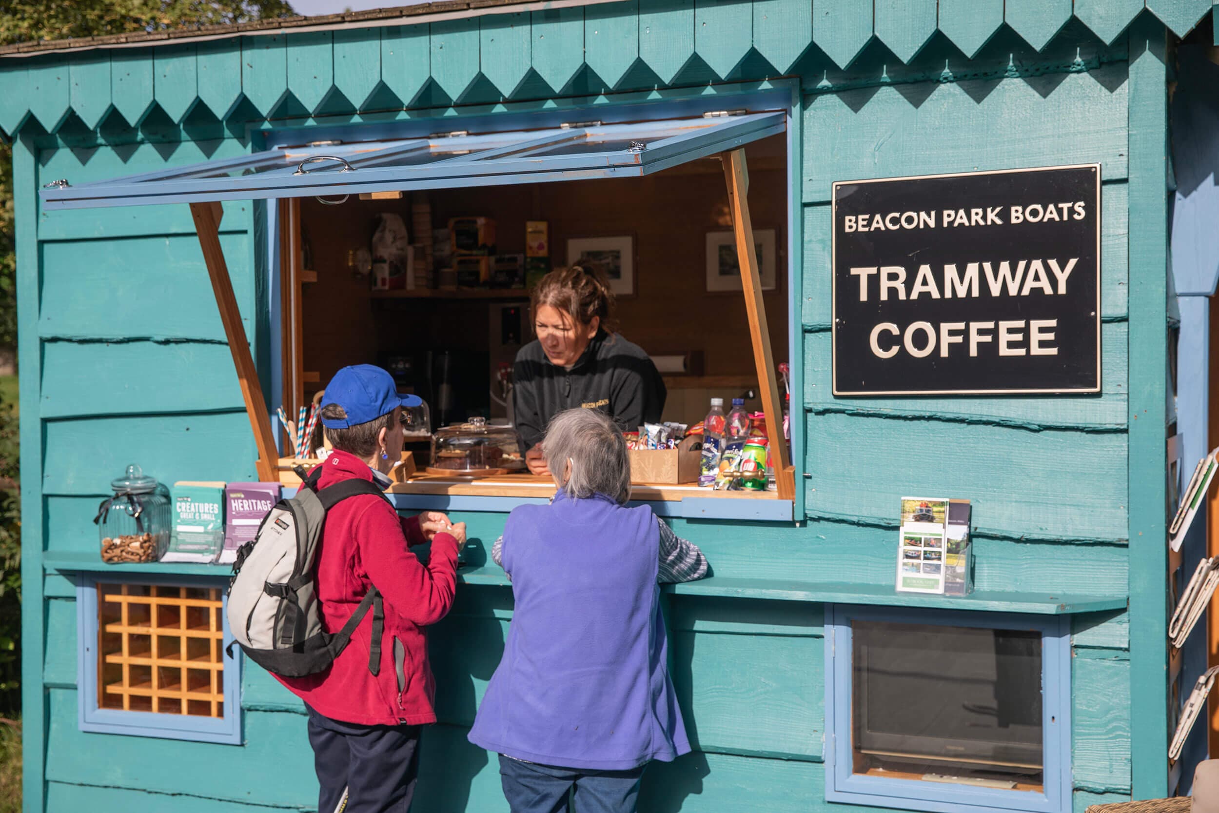 Serving coffee at the Tramway coffee shop